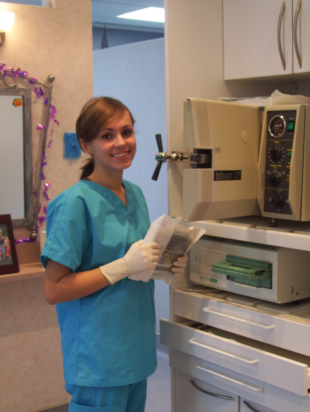 Picture of a student wearing scrubs